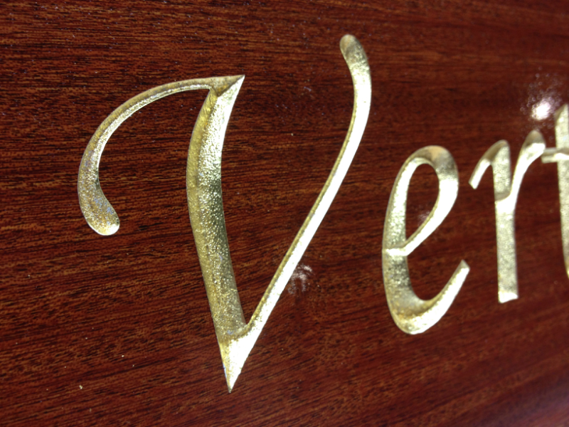 Gilded signs for yachts and houses
